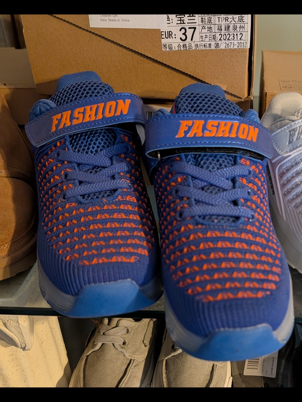 Kids' Blue Roller Shoes with Orange Accent - Picture 2 of 5